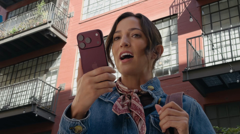 iPhone 18 Pro in Burgundy being held in hand