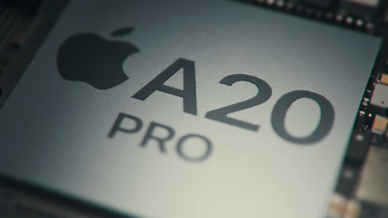Macro view of the Apple A20 Pro chip.