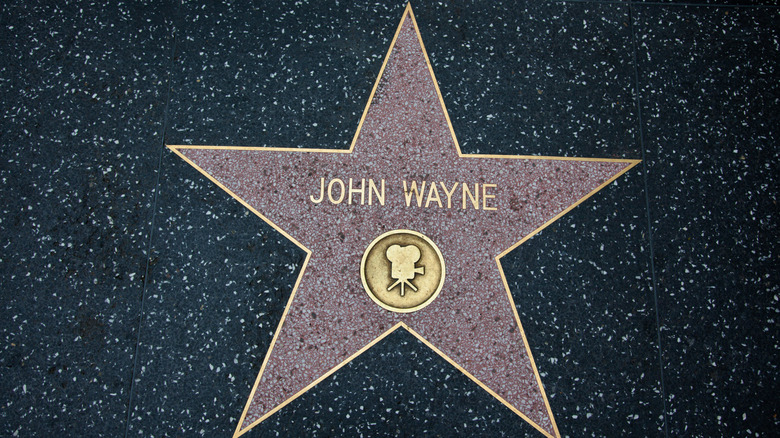 A close-up shot of John Wayne's star at the Hollywood Walk of Fame.
