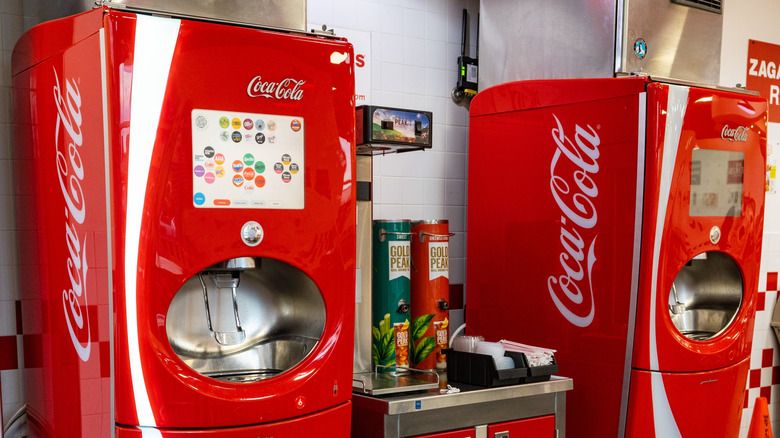 Two Coca Cola Freestyle machines in a restaurant