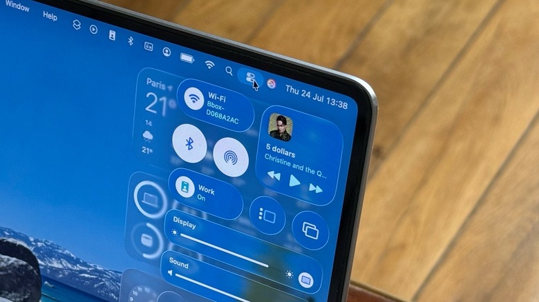 macOS Tahoe's Control Center highlighted on a MacBook Pro