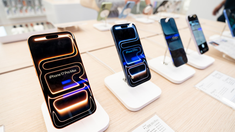 iPhone 17 Pro Max, 17 Pro, and Air default wallpapers visible.