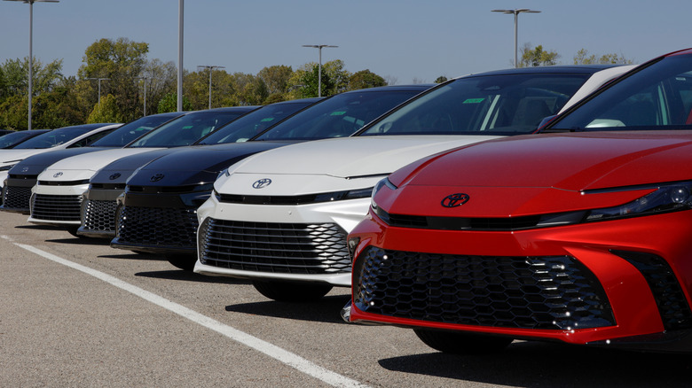 a line of Toyota Camry's at a dealership