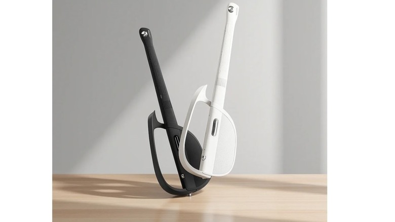 LiberLive C2 stringless digital smart guitar is pictured in two colors, white and black.