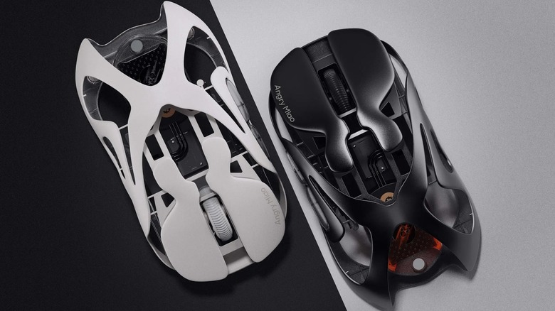 Black and white Angry Miao wireless AM Infinity Mice in front of white and black backgrounds