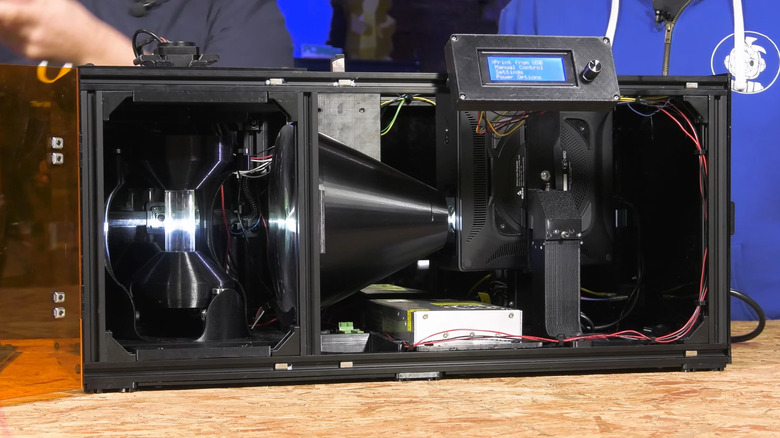 Taylor Waddell shows off an example of a open source OpenCAL printer build
