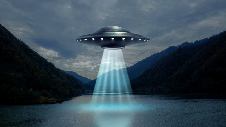 Artistic rendition of UFO over a lake