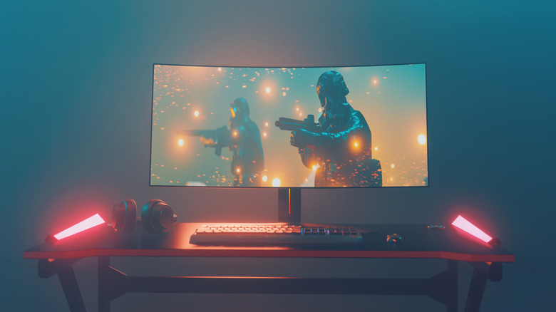 A gaming setup built around a curved monitor