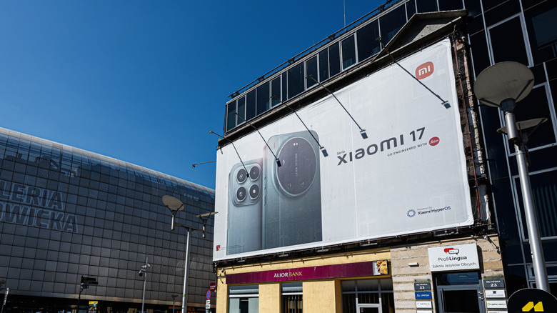 A billboard advertising the Xiaomi 17 series of smartphones.
