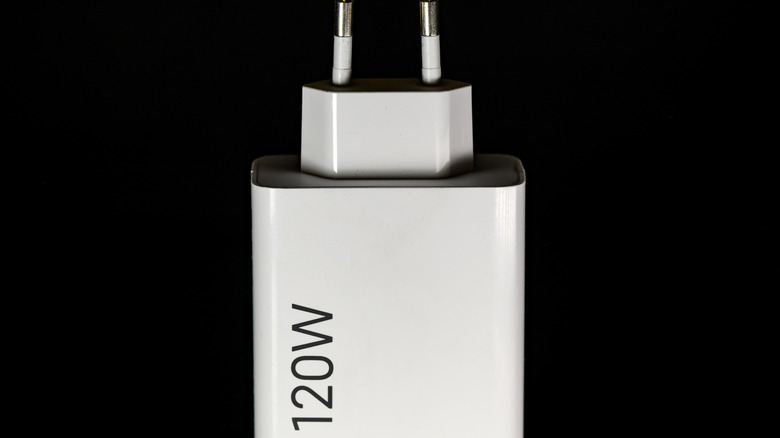 A Xiaomi HyperCharge adapter rated for 120 watts of throughput.
