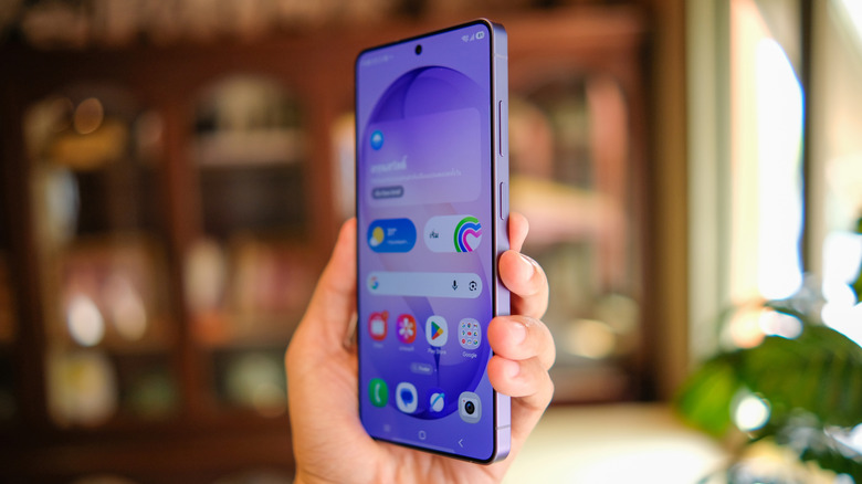 A person holding a Samsung Galaxy S26 Ultra phone at a slight angle