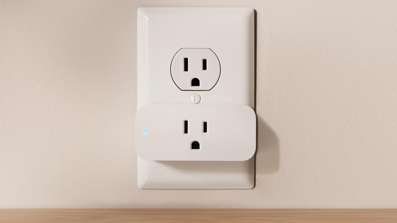 An Amazon Smart Plug attached to a wall outlet