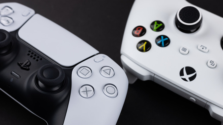 PS5 DualSense and Xbox Series controller against a black background