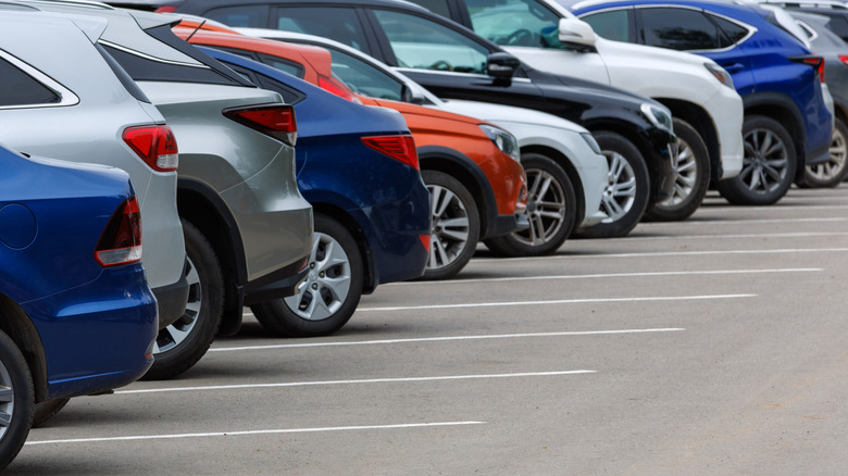 Cars in a parking lot.