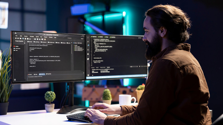 man working computer desktop