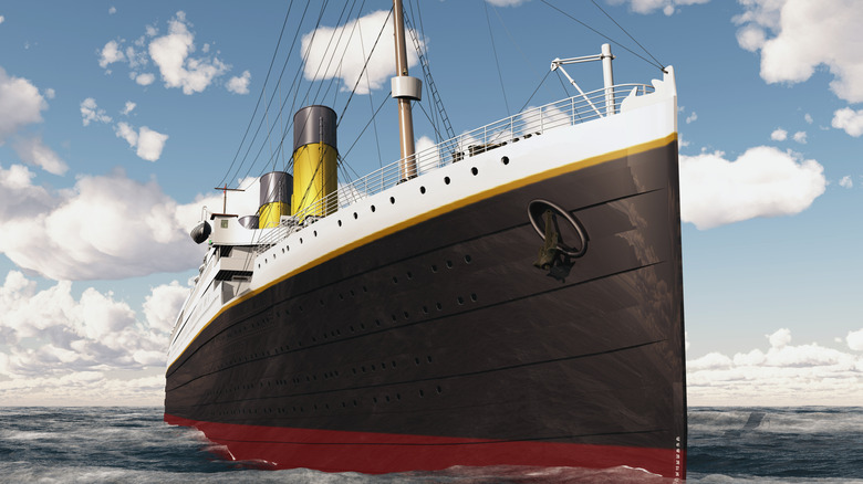 model of the RMS titanic on the open seas, clouds in the background