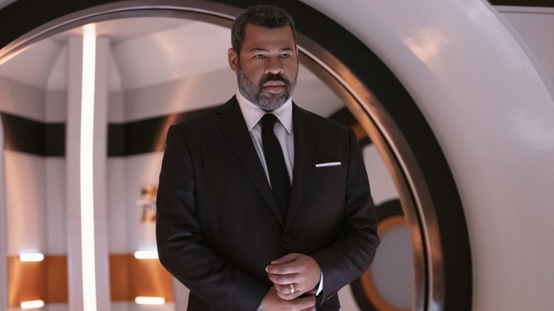 Jordan Peele in a suit in 