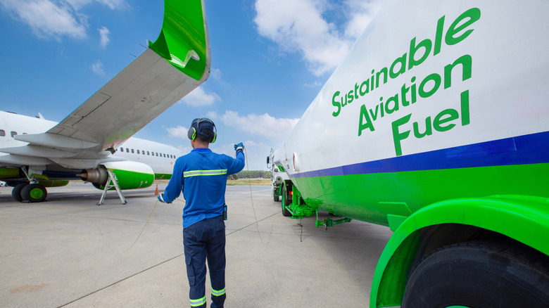 A plane being refueled at the airport