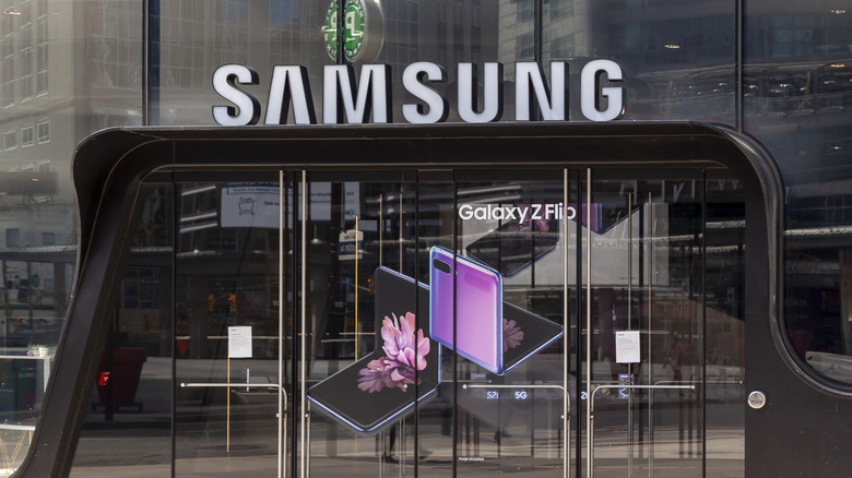 Front on a samsung store with a Galaxy Z Flip advertisement