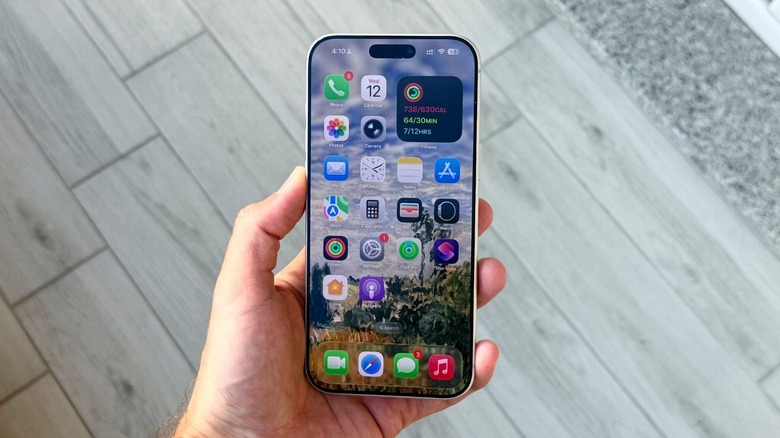 A hand holding an iPhone 17 Pro Max