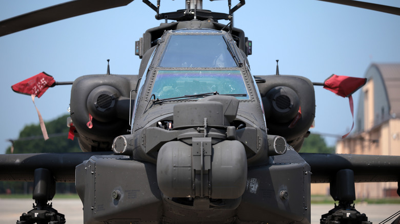 A front view of the Apache canopy as it's parked on a tarmac.