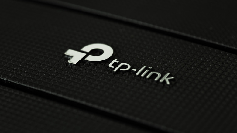 TP-Link logo on top of a wireless router.
