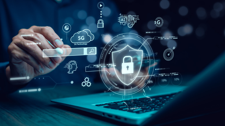 A concept image showing a hacker stealing passwords.