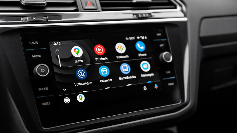 A vehicle's infotainment system displaying a list of apps from Android Auto's main interface