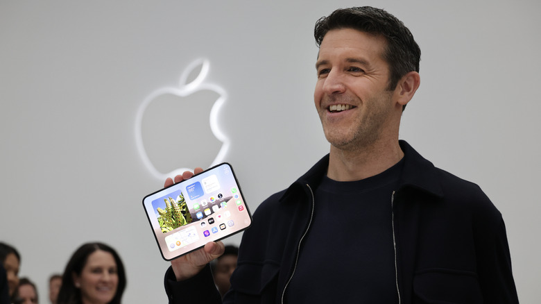 Apple CEO John Ternus holds the iPhone Duo during Apple's 