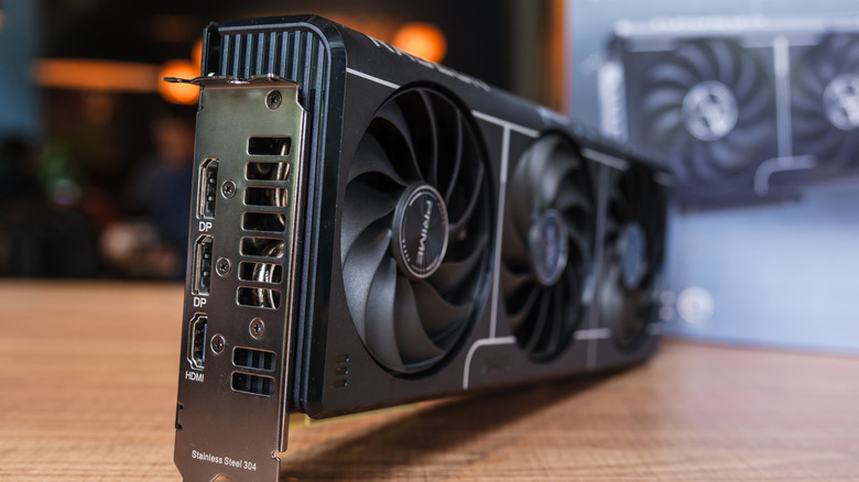 Graphics card on its side atop a wooden table