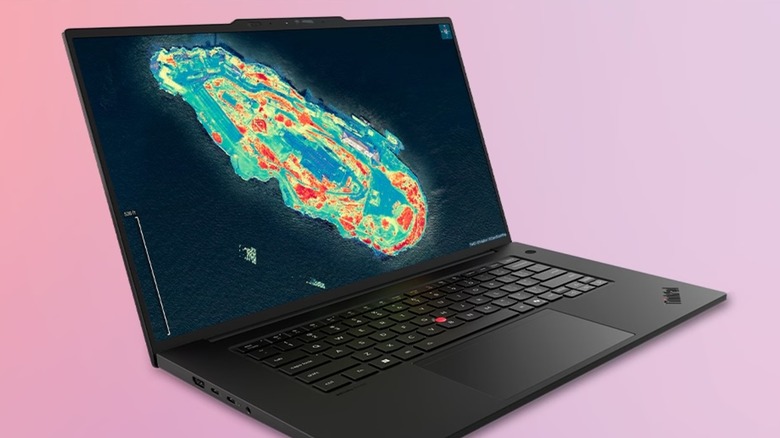 A black Lenovo ThinkPad P1 Gen 9 sitting against a pink backdrop