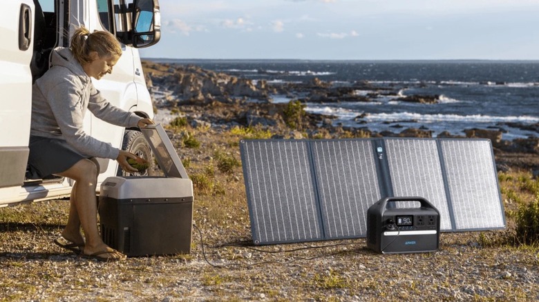 Woman outside a trailer with Anker products