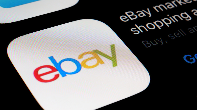 An eBay app icon shown on a smartphone screen