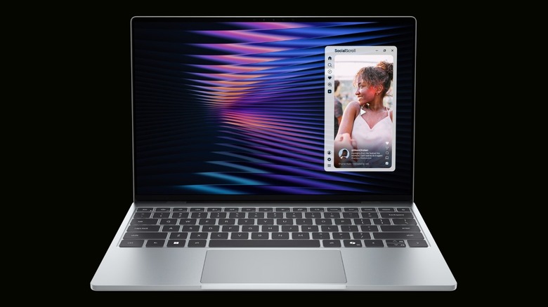 New XPS 13 Laptop showing a social media application on a black background