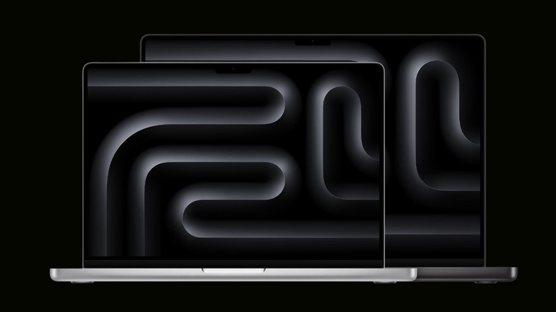 MacBook Pro 14 and 16-inch models on a black background
