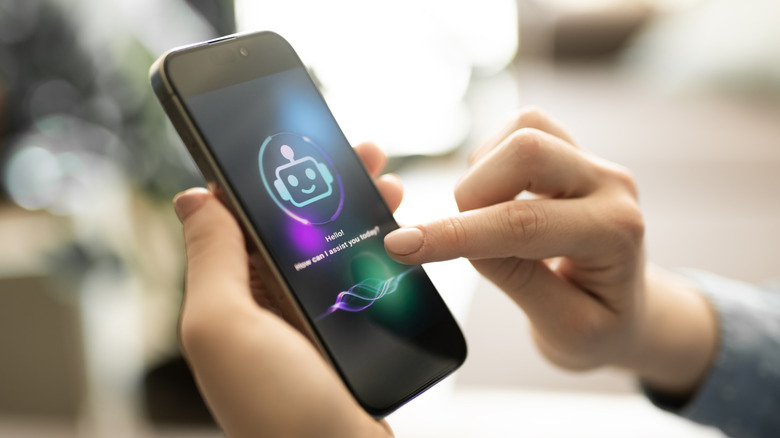 Hands holding a phone with a generic AI chatbot image