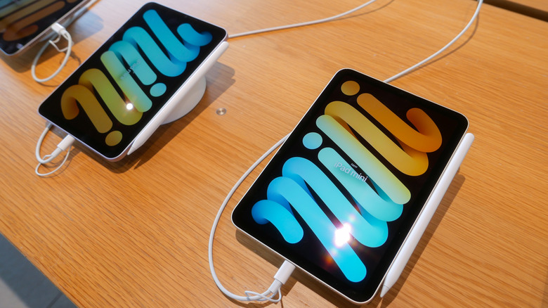 Two Apple iPad minis on display