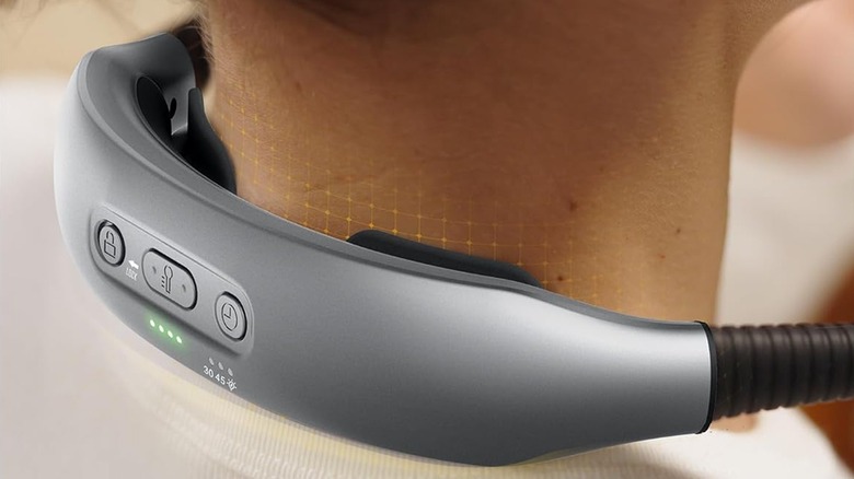 Glucosent Ergonomic Reading Light on someone's neck