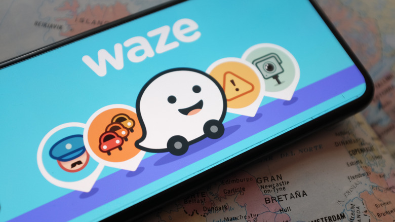 Smart phone screen displaying the Waze logo