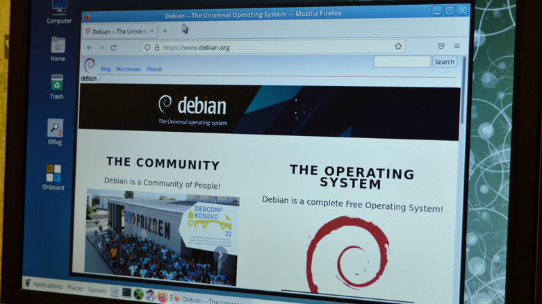 A computer screen with the Debian website open.