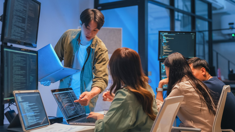 A programmer leading team mates