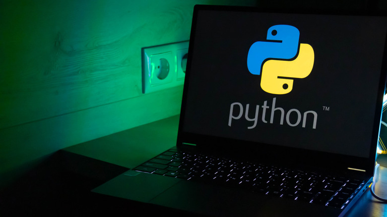 The Python logo on a laptop screen.