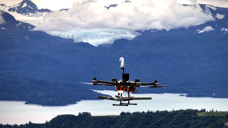 A cloud-seeding drone with clouds behind