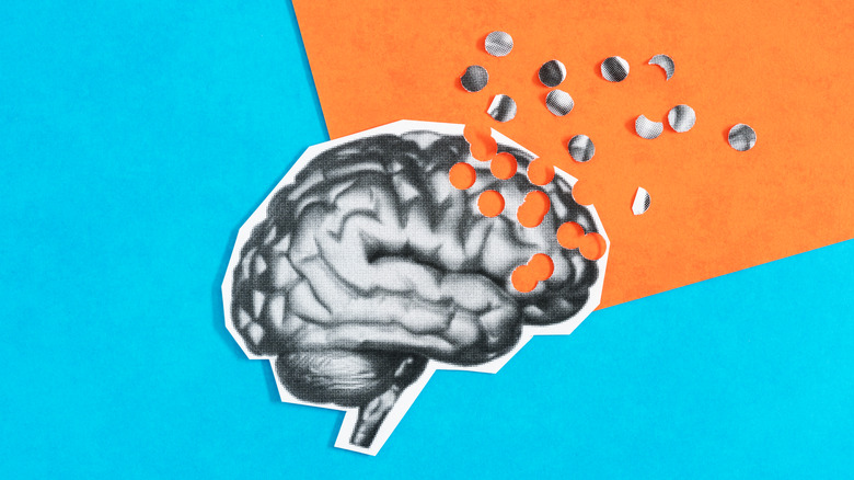 art of a brain with pieces missing from it related to Alzheimer's