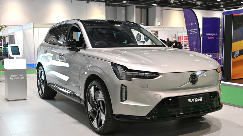Volvo EX90 three-row electric SUV in a showroom