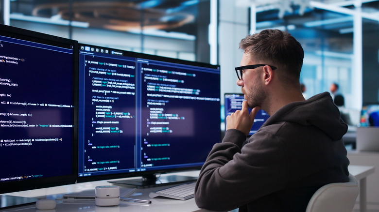 A software developer using vibe coding to create an app