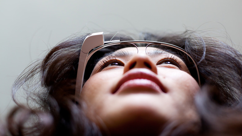 Person wearing Google Glass viewed from below.