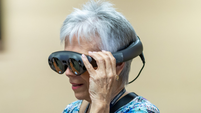 Person wearing a Magic Leap One mixed reality headset.