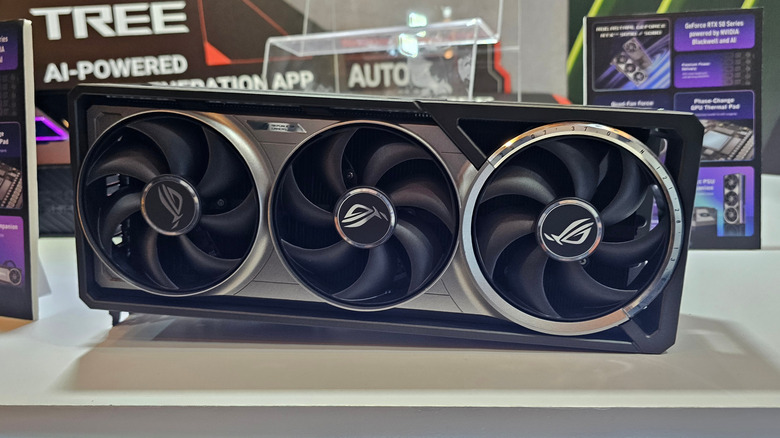 A three-fan graphics card on display