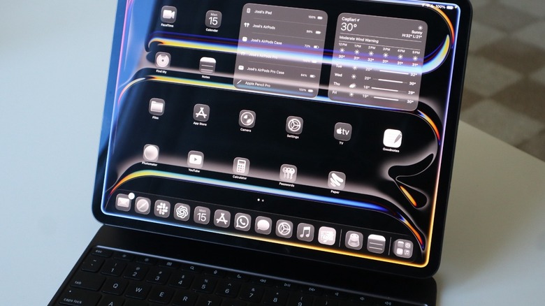 An iPad attached to a Magic Keyboard